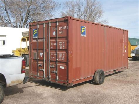 moving liquid totes with skid steer|moving shipping containers with trailer.